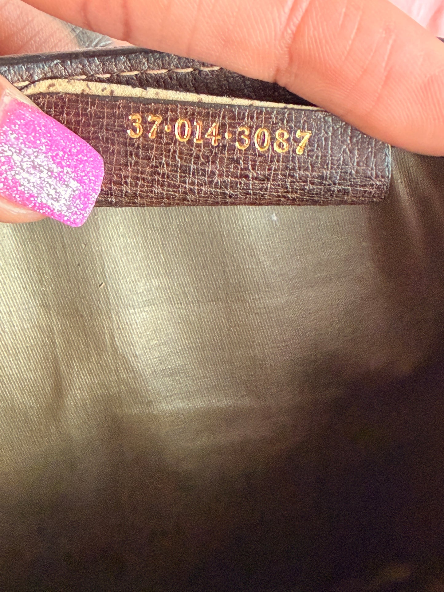 Gucci brown clutch