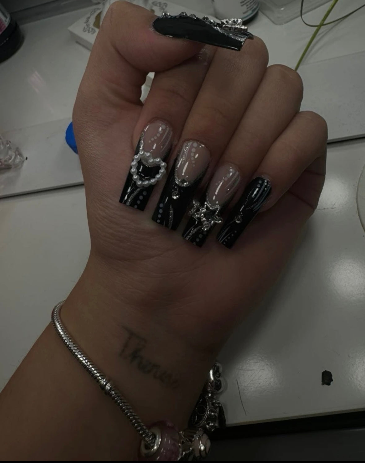 “Off black” press on nails